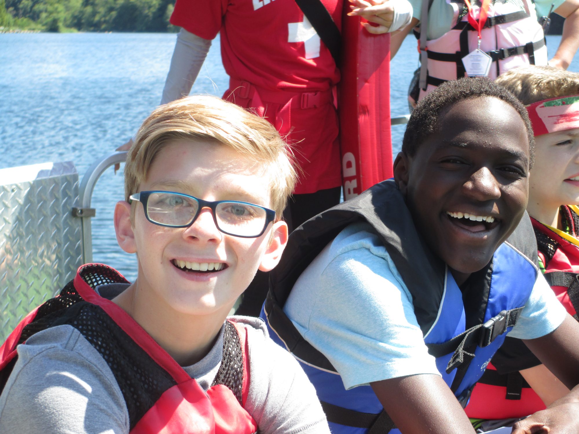 happy campers boating and fishing